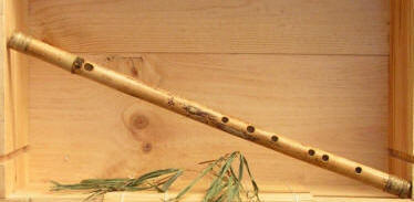 One of my first bamboo flutes which would've been back in 2001 or 2002 when I was around sixteen years old (photo is from back then too, can you tell). I harvested the bamboo for this in Florida where I was living at the time.