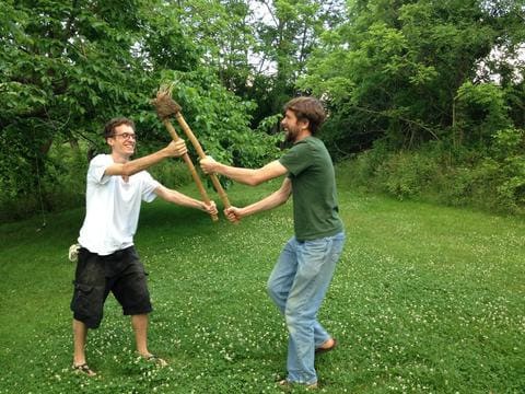 Me and Jem play fighting over the "wishbone" Madaké root end bamboo that I harvested for shakuhachi, NC, 2013