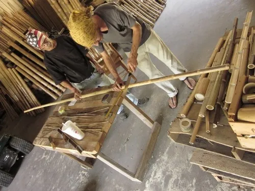 Me on the right cutting a pole of Makino bamboo with Keiji on the left, Haiku bamboo warehouse, 2012