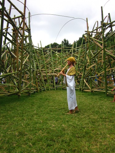 Josen performing shakuhachi with Buto dancers for Tetsunori Kawana's unveiling of Madaké bamboo installation, 2011